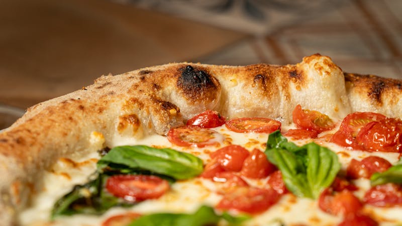 Margherita pizza with fresh mozzarella and basil - anthonys coal fired specialty